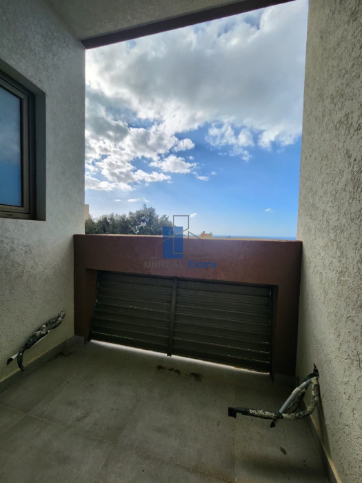 property in Adma with sea view 