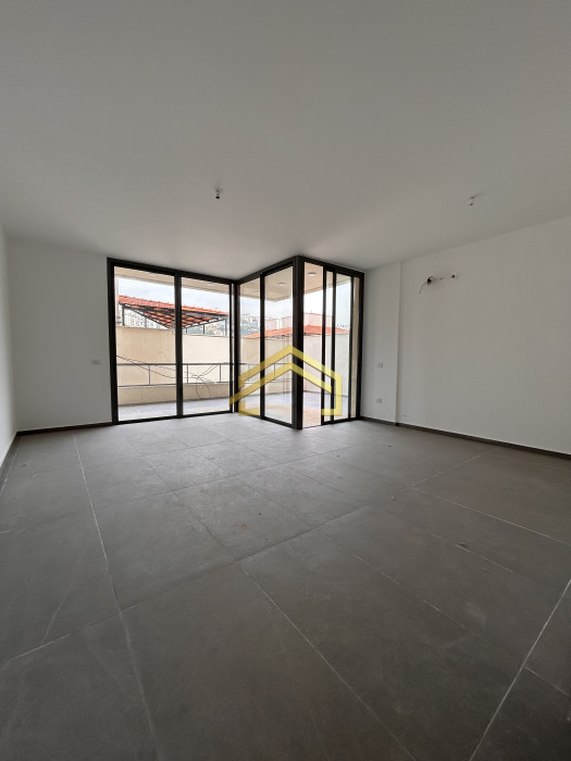 Elegant 128 sqm apartment + 45 sqm terrace for sale in Hazmieh New Martakla.