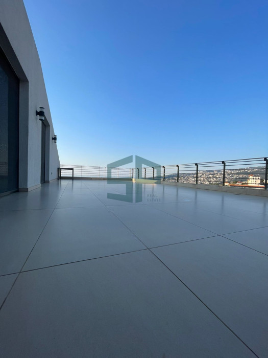 Spacious roof with panoramic view in qornet el hamra