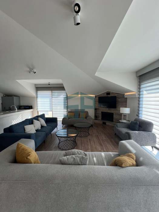 spacious  fully furnished high ceiling duplex in a calm area in ain saade with a panoramic view